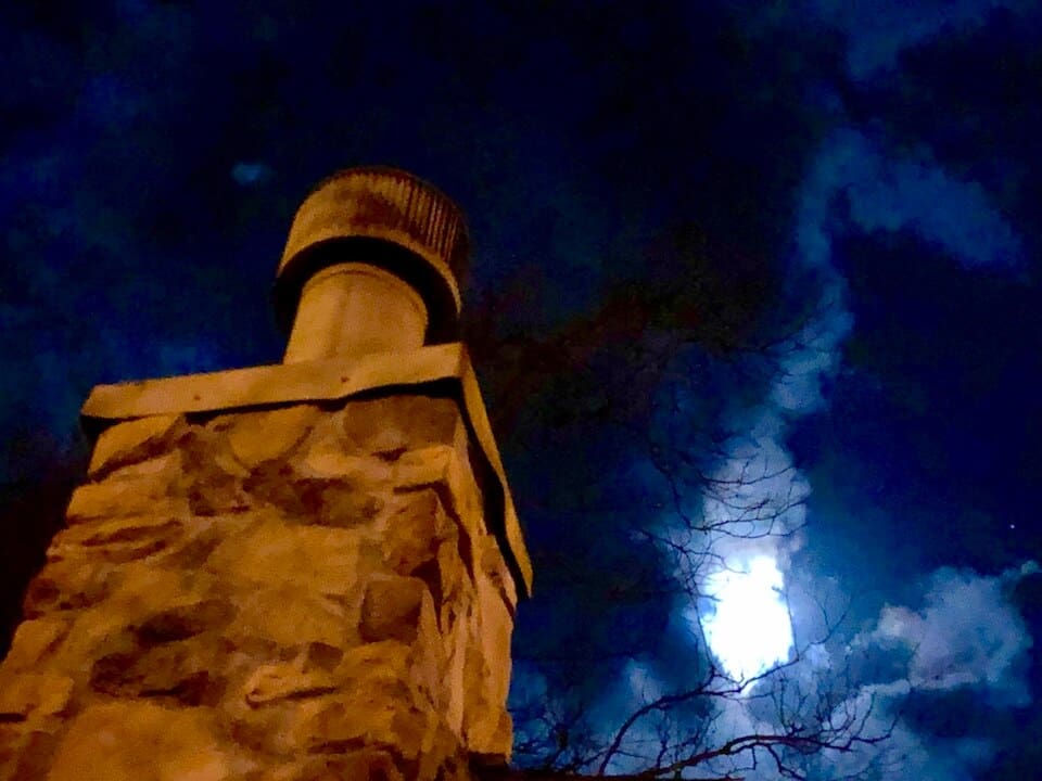 Night sky with chimney and bright moon