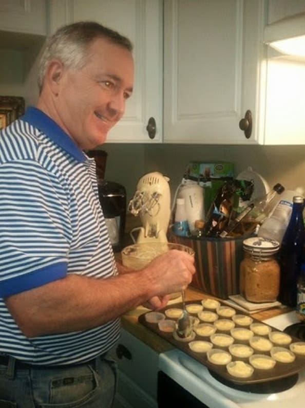 Baker Patton cooking up his miniature cheesecakes.