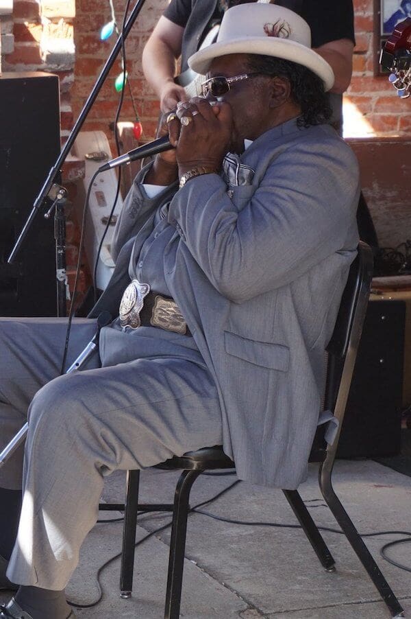 Big George Brock playing in front of Cat Head in Clarksdale. Photo by Andrea Vlonk