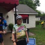 Man in cycling shirt with cooler