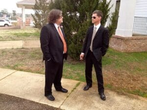 Billy Howell and Randall Andrews standing outside Coleman Funeral Home in Oxford, MS prior to funeral for Chef Levi Minyard. Photo by Delta Bohemian