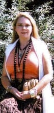 Blonde woman posing in nature setting
