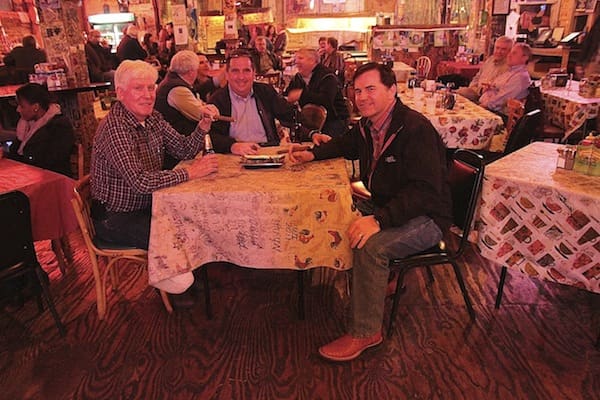 Tourists enjoying a cigar at Ground Zero Blues Club in Clarksdale. Photo by Delta Bohemian