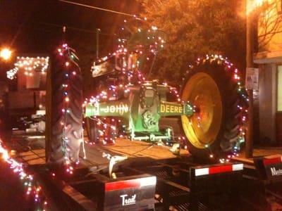 Festive lights on vintage tractor display