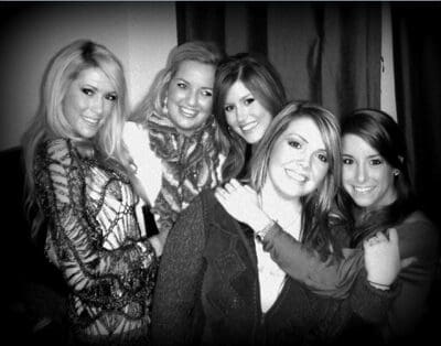 Group of smiling friends posing together