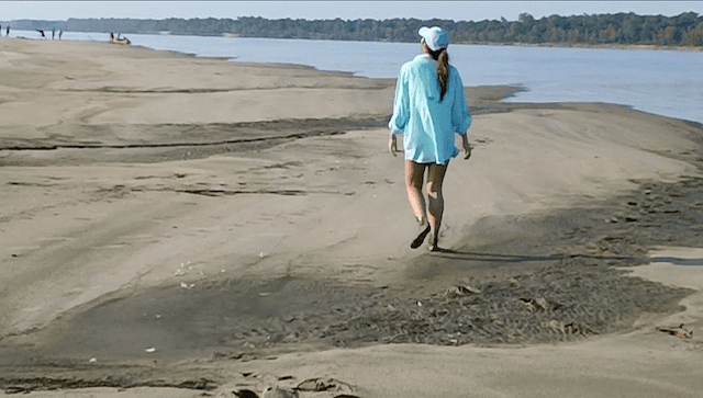 Corinne Vance on a Mississippi River sandbar. Photo credit: DELTA BOHEMIAN