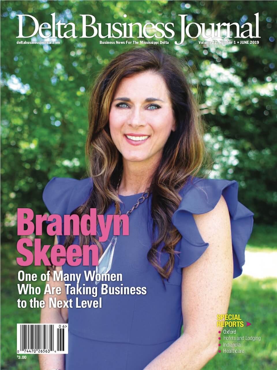 Woman in blue dress on magazine cover
