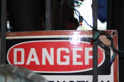 Danger sign partially obscured