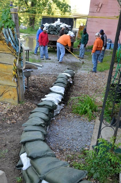 Yazoo Mississippi Levee Board laying sandbags at Quapaw. Photo by John Ruskey