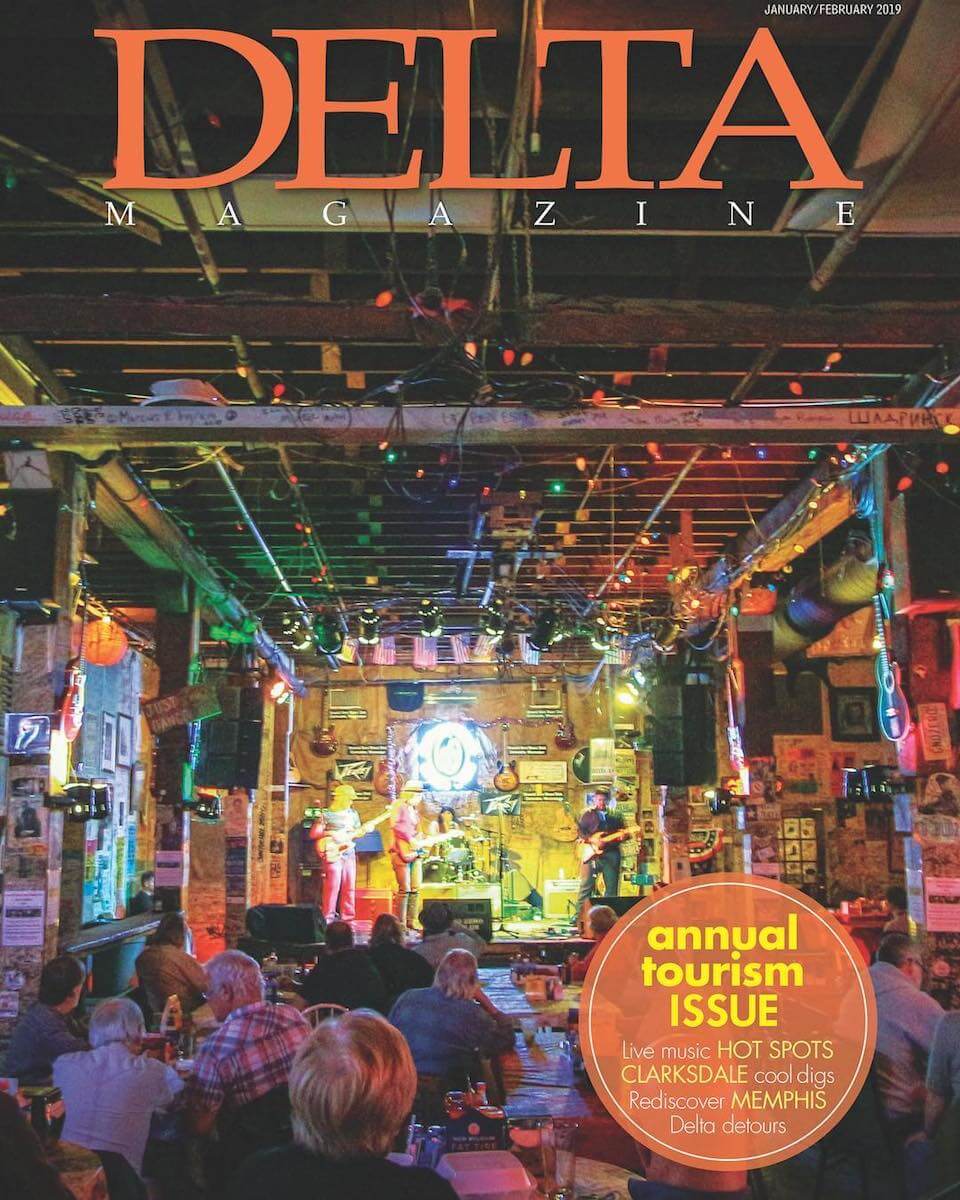Colorful bar interior on Delta Magazine cover.