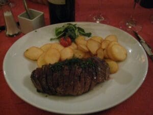 Enjoying a Duck dinner at Au Petit Sud Ouest. Levi enjoyed preparing duck. Photo by Guest Bohemian Jay Hughes
