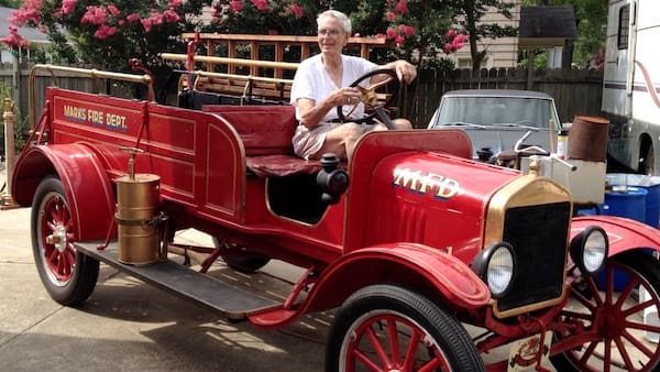 Vintage fire truck with driver