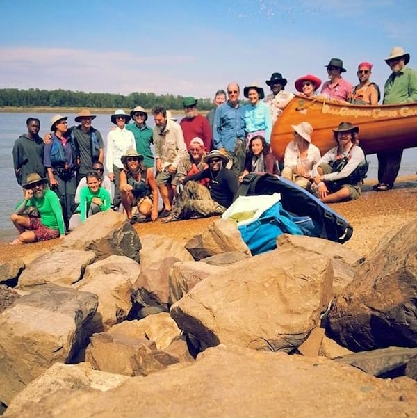 People gathered on rocky beach
