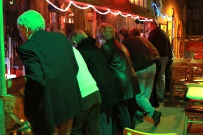 Something below in the Juke Joint Chapel has got these locals attention. The Balcony view is fun! Photo by The Delta Bohemian