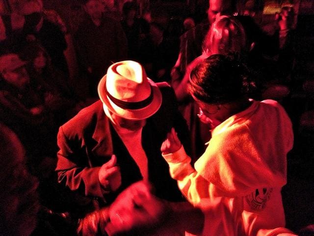 Dingo dancing with his wife B at Red's Blues Club