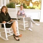 Californians Katie Anderson and Lisa Jordan and authors of PUT SOME SOUTH IN YOUR MOUTH enjoying the front porch of The Clark House in Clarksdale, MS. Photo by The Delta Bohemian