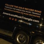 Bus with Americana Music Triangle logo