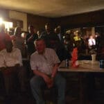 Group of people gathered at a table.