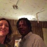 Two people smiling, one woman, one man.
