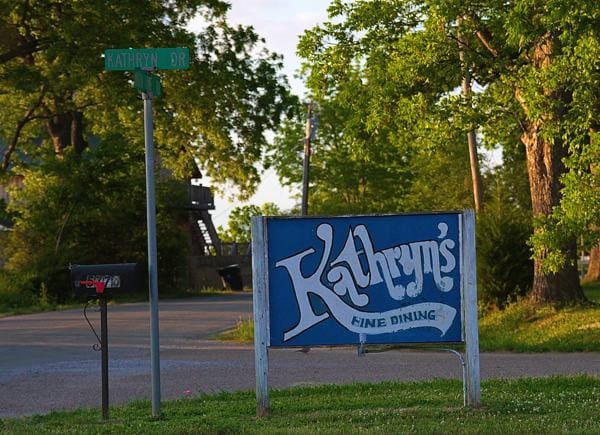 Street and Kathryn's restaurant sign
