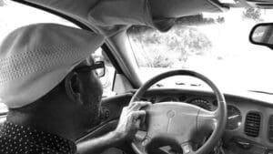 Clarksdale Taxi Cab Driver Roosevelt Noah driving his Jolly Cab