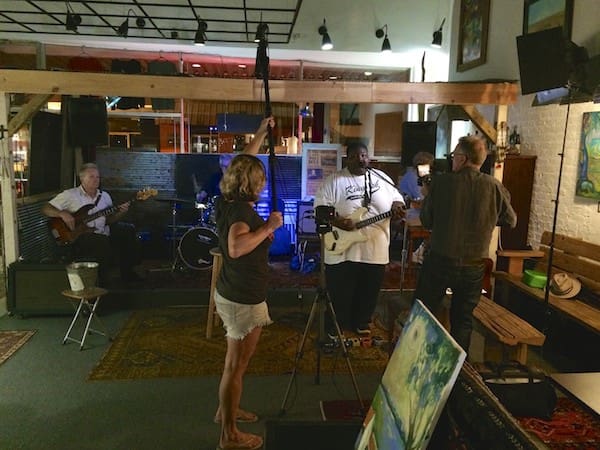 Band setting up for a live performance.