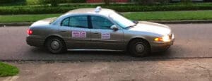 Clarksdale Taxi Cab Driver Roosevelt Noah's Jolly Cab leaving the Clarksdale White House