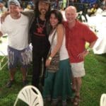 Friends gathered at a summer festival.