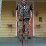 Delta Bohemian Adam Britt about to head out and do some four-wheeler riding behind the levee. Photo by The Delta Bohemian