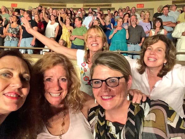 Group of friends at a crowded event