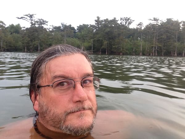 Man swimming in a lake