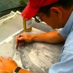 Delta Bohemian Lil John McKee reviewing a map of his land. Photo by The Delta Bohemian