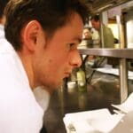 Chef Levi watching the chefs with great intensity and anticipation during FRENCH NIGHT MADIDI. Photo by Rachel Bush.