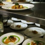 Executive Chef Dan Blumenthal's creation...some plates waiting for sauce. Photo by Rachel Bush.