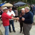 Group of people at an outdoor gathering.
