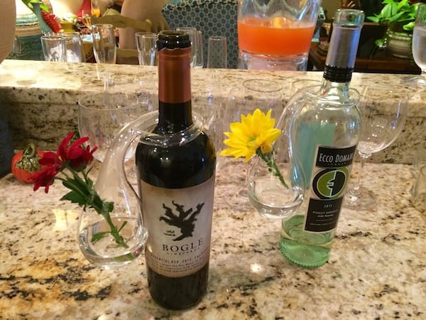 Flower decanters decorating the wine at the Clarksdale Garden Club gathering.