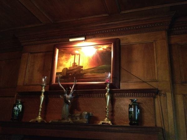 A painting of a showboat on the Mississippi River by Marshall Bouldin III hanging in his home in Clarksdale.