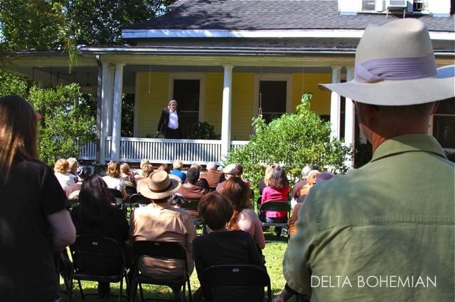 Outdoor audience watching porch performance