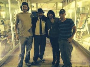 Musicians Josh McDowell, Steve Kolbus, Jaxx Nassar, Cade Moore in front of Bluesberry Cafe