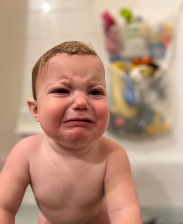 Upset toddler during bath time