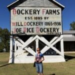 Dockery Farms sign with a woman standing in front.