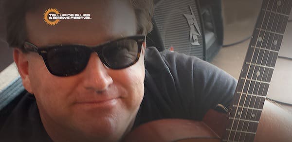 Close-up of guitarist wearing sunglasses