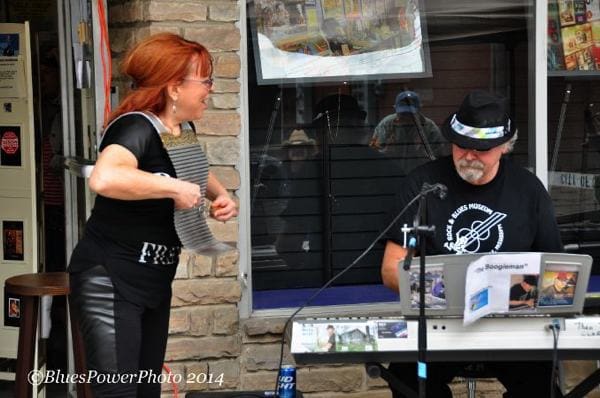 Musicians performing outside a venue