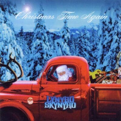 Santa in truck with Christmas gifts