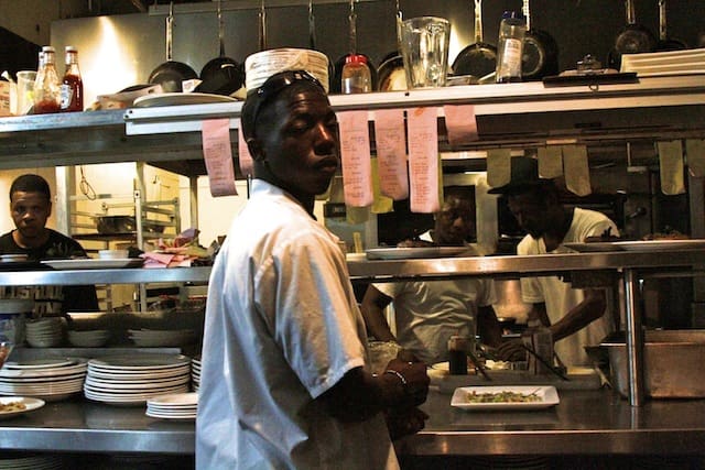Part of the fantastic kitchen staff. l-r Sous Chef Tony Dampier, Expeditor and Washer Little Jerry Hayes, Head Chef Carl Jackson, Lead Line Cook Lorenzo Jackson working hard on final night of business at Madidi. Photo by Delta Bohemian
