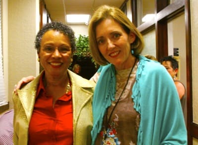 Two women smiling at the camera