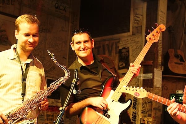Two musicians playing instruments together