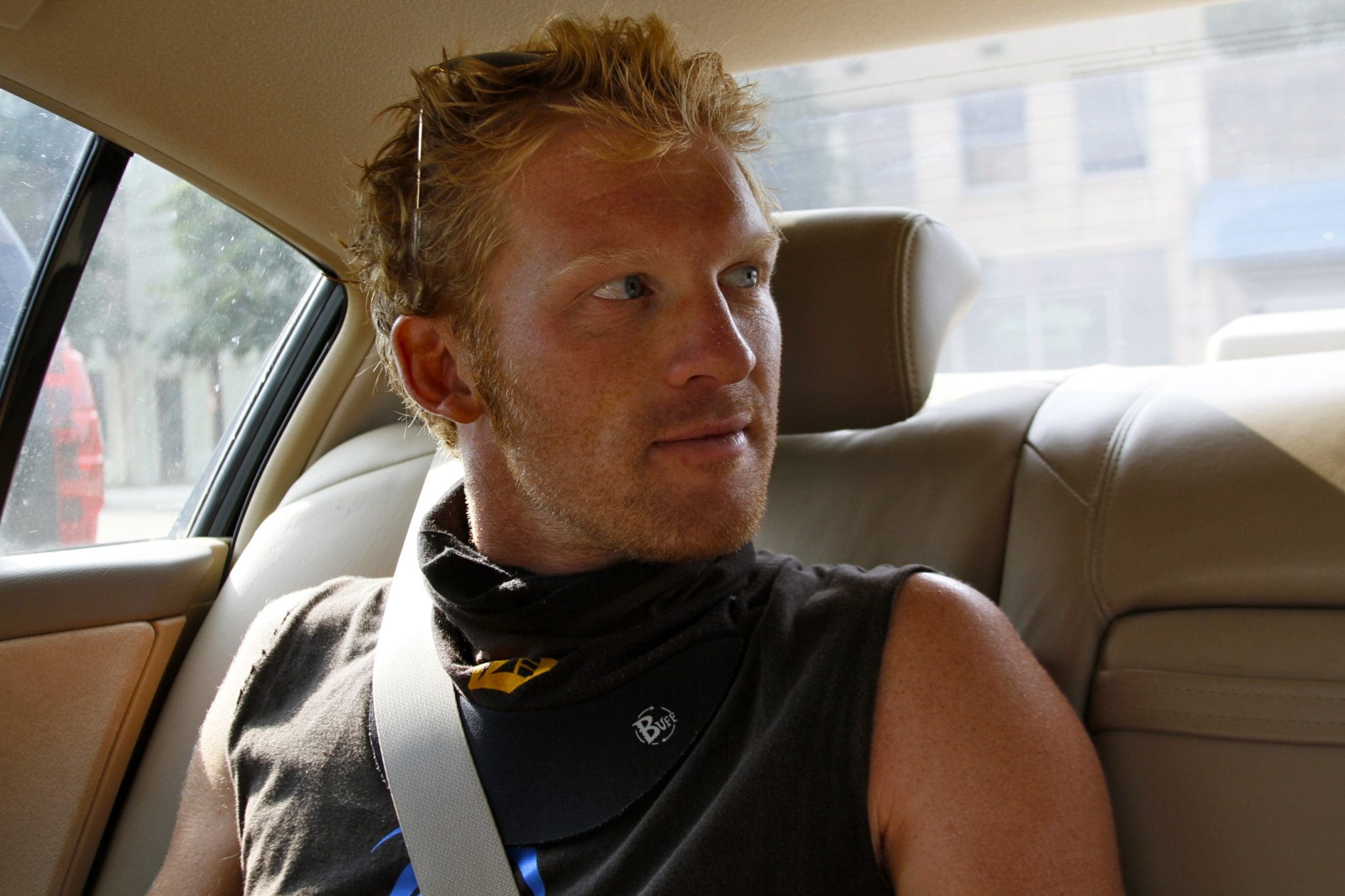 Passenger wearing a black sleeveless shirt