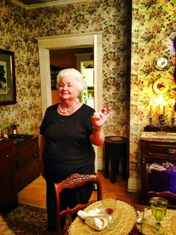 Cozy dining area with an older woman