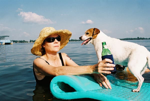 Maude Schuyler Clay with Snowy on Moon Lake. Photo by Langdon Clay